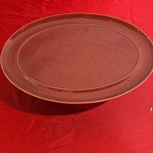Denby Platter Harlequin 14.5 X 10. Deep Red stoneware. Small bite on lip.